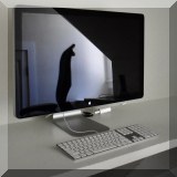 E08. Mac computer screen and keyboard. 